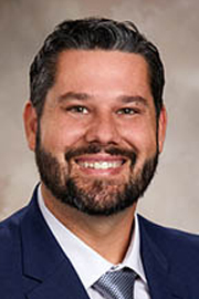 Dustin Begosh-Mayne, M.D.  