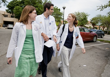 Doctors walk to clinic center