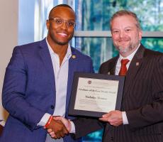 Nicholas Thomas and Health and Human Sciences interim dean Damon Andrew