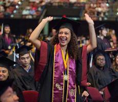 Photo of student with cap and gown