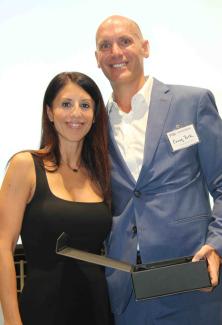 Melodie Mope standing next to Criag Yunk holding the 2026 Guardian of the Mission Award