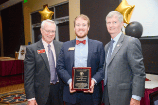 Kevin Coughlin receives  deans award.