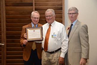 Dr. Robinson with Dr. Berg and Dean Fogarty