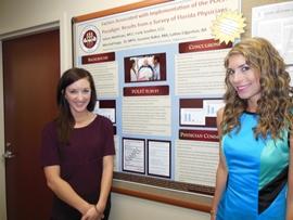 Studens in front of the poster