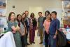 Dean Littles and Xian Jin Xie pictured with the Jia lab members after presenting a gift for recent R01 funding. 
