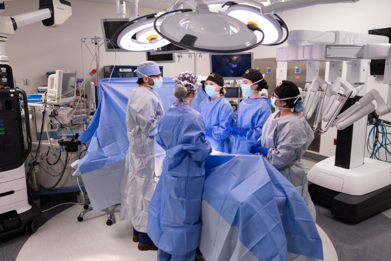 Fellows perform surgery