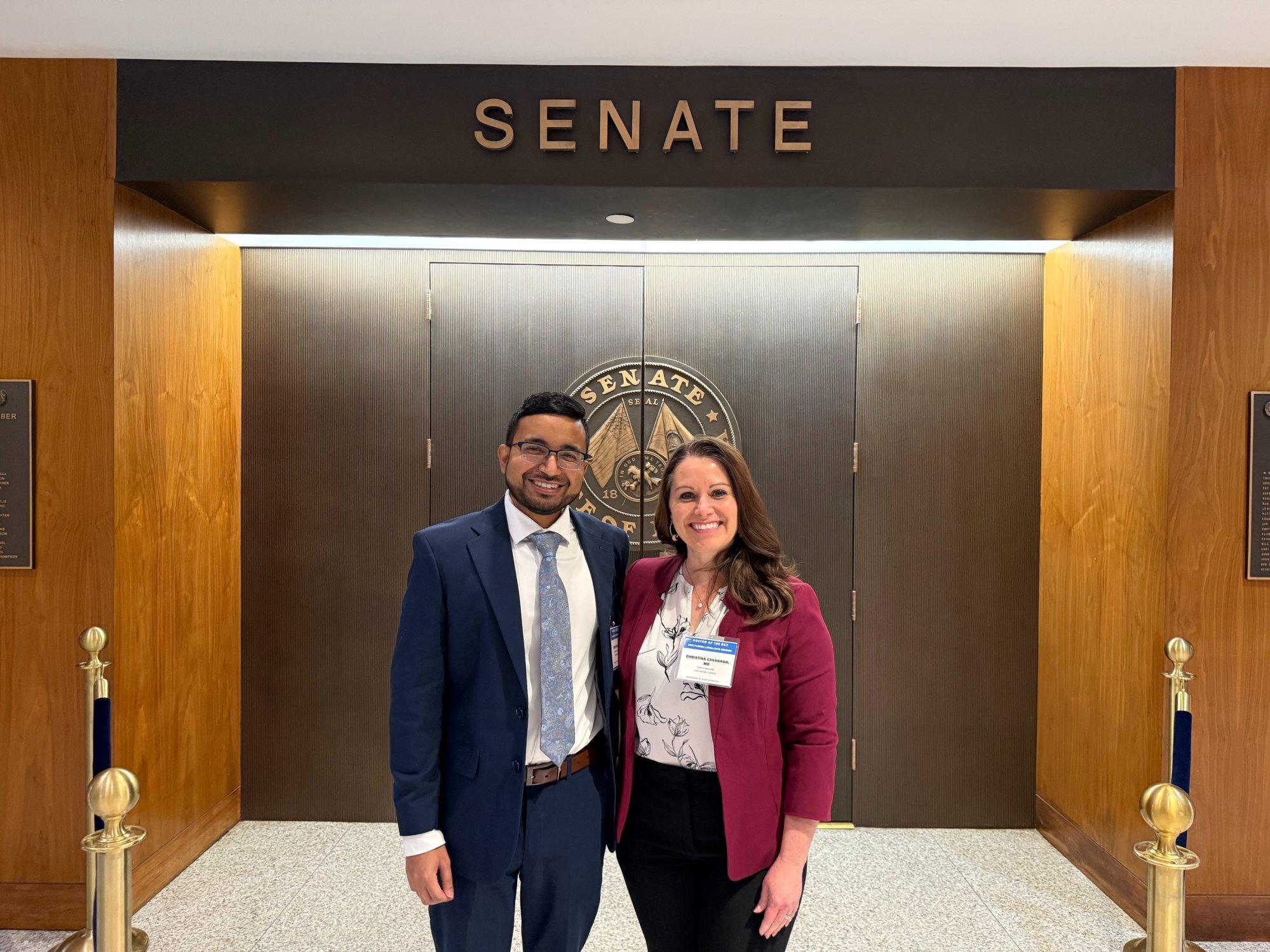 A male and female resident in the lobby of the state senate