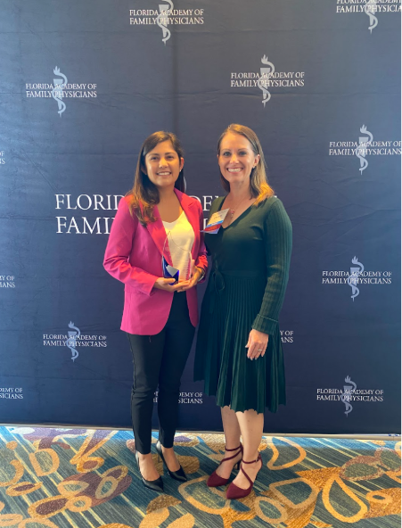 Two faculty members at an event for the Florida Academy for Family Physicians