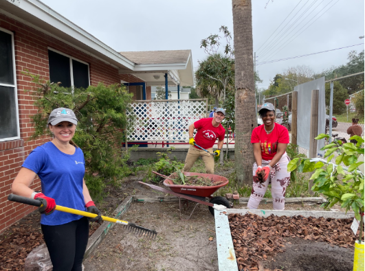 FSU faculty clean up an outdoor space