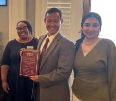 Eugene Sun, M.D., receiving the Outstanding Clinical Faculty Award.