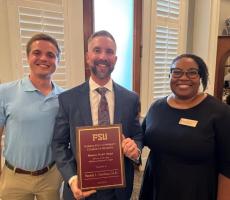 Patrick Hawkins, M.D., receiving the Mission Model Award.